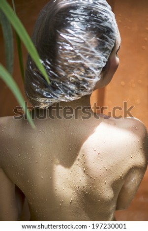 Beautiful back of a young woman after shower