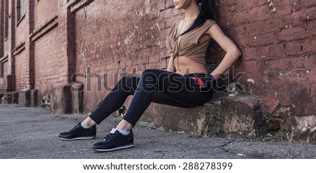 female jogger in bright sportswear smiling looking away, advertising for sports