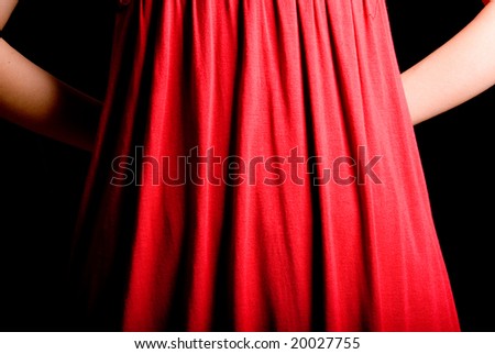 slim finger gesture on fresh red skirt