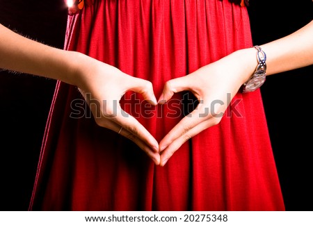 slim finger gesture on fresh red skirt