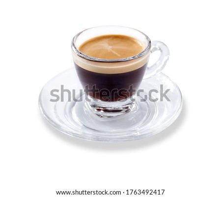 Angled view of a modern glass expresso cup and saucer full of smooth expresso coffee, isolated on white with a slight drop shadow ストックフォト © 