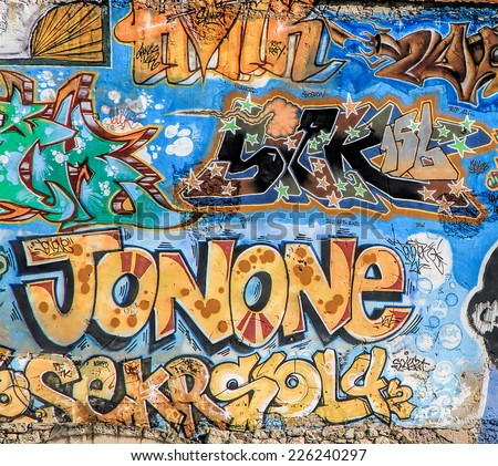 SETE, FRANCE - September 03, 2014: Graffiti tags on the wall of Sete, south of France