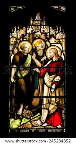 EDINBURGH, SCOTLAND - OCTOBER 02, 2014: Stained glass window illustrated Bible stories in the St Giles\' Cathedral of Edinburgh, Scotland, UK.