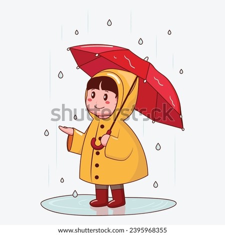 Little Kid wear a raincoat and using an umbrella in rain