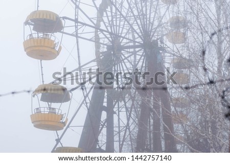 Similar – Image, Stock Photo barbed wire and carousel in amusement park in Chernobyl