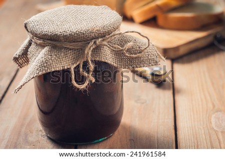 Strawberry Jam, bread on the table background