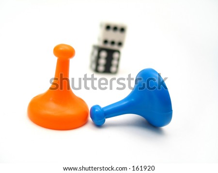 Game playing pieces from a board game set.