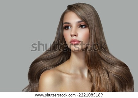 Similar – Image, Stock Photo Woman with big eye looking through a magnifying glass