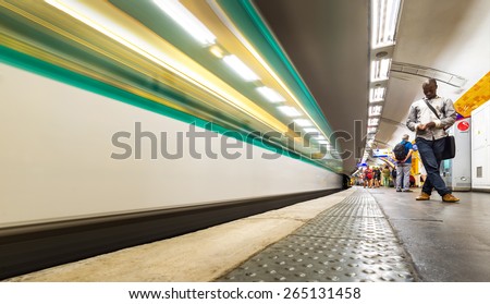 PARIS - JULY 20: Train arriving in the Nation metro station on July 22, 2014 in Paris, France.
