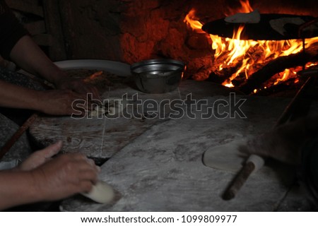 Peasant women are making natural and delicious bread. Stok fotoğraf © 