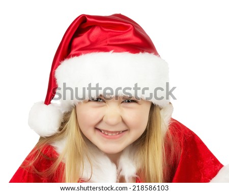 pretty little girl in Santa Clause costume on the white background