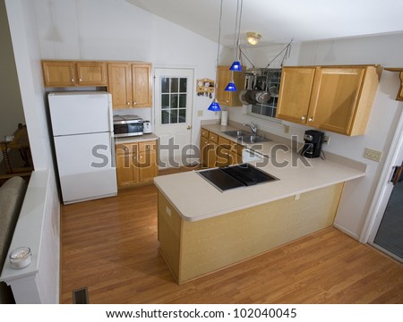 Small kitchen with wood looking floors on the Blue Ridge of Virginia