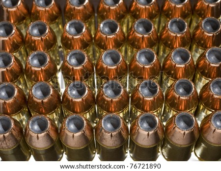 Bullets with orange copper plating with back and side lighting