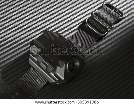 Flashlight meant for use with a gun that is worn on a wrist