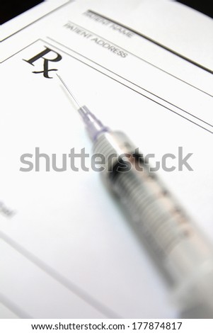 syringe on medical prescription