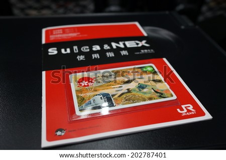 Tokyo, Japan- Jan 7, 2014: The Suica is a prepaid e-money card for moving around and shopping.The Suica can be used not only for JR East trains, but subways and buses as well.