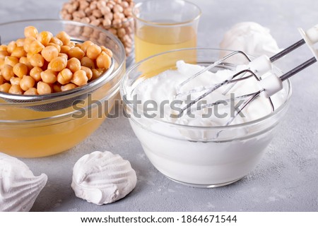 Vegan meringue, boiled chickpea and aquafaba. Vegan cooking concept. Healthy product. Substitute egg for vegan recipes Foto d'archivio © 