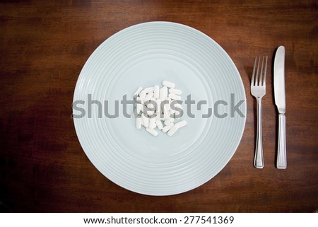Diet pills on a plate