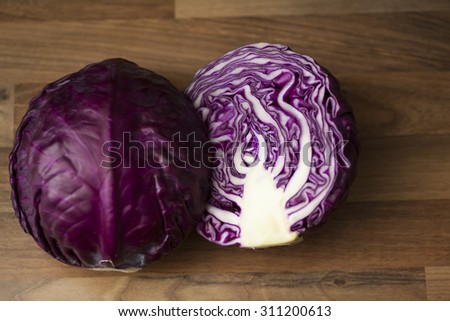 Cross section of a raw red cabbage cut in half. Showing great purple colour and texture