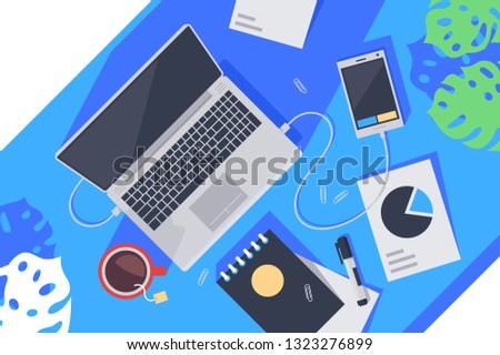 Flat desktop top view with laptop, tea, notebook, mobile phone and diagram. Concept workplace, workspace with special equipment for freelance. Vector illustration.