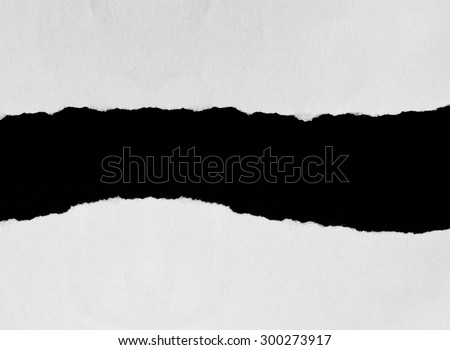 Torn Pieces Of Paper On Black Background Stock Photo 300273917