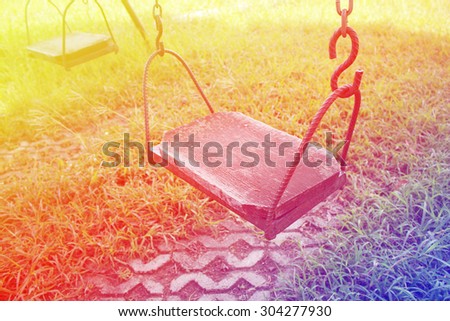 old swing with soft background (retro style)