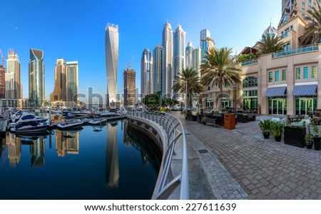 DUBAI, UAE - OCTOBER 12: Modern buildings in Dubai Marina, Dubai, UAE. In the city of artificial channel length of 3 kilometers along the Persian Gulf, taken on 12 October 2014 in Dubai.