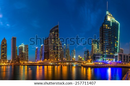 DUBAI, UAE - OCTOBER 10: Modern buildings in Dubai Marina, Dubai, UAE. In the city of artificial channel length of 3 kilometers along the Persian Gulf, taken on 10 October 2014 in Dubai.