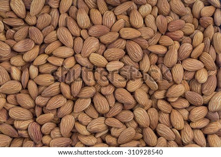 Peeled almonds closeup. For vegetarians