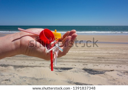 Similar – Foto Bild Am Strand gesammelte Plastikpfropfen.