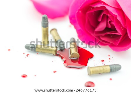 bullet on blood and red rose isolated on white background