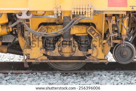 closeup wheel break and suspension system of diesel train
