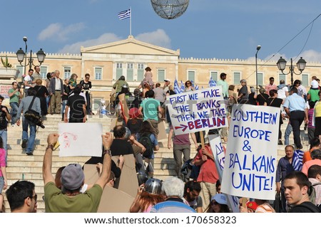 ATHENS, GREECE-MAY 29 Demonstrators holding placates with anti-German slogans in front of Greek Parliament, in Athens, May 29, 2011.