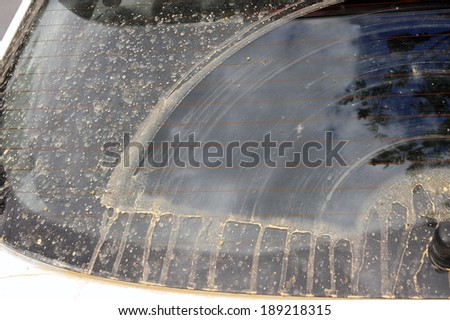 ATHENS - APRIL 25, 2014.\' Sahara rain\' leaves cars coated in a thin film of  African desert dust. This phenomenon means polluted air for a few days and lately in Europe happens quite often.