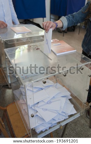 Agii Theodori, GREECE MAY 18, 2014. First round of the municipal and regional elections in Greece, on Sunday, May 18, 2014.
