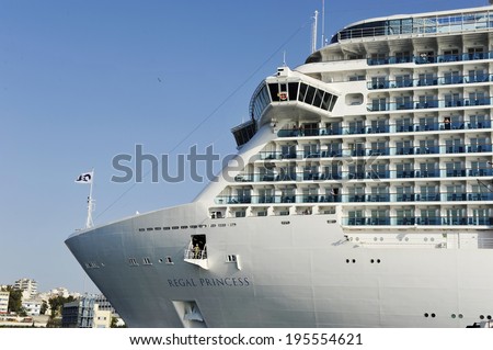 PIRAEUS, GREECE -MAY 27, 2014 Regal Princess, Royal class cruise ship owned by Princess Cruises, departs from Piraeus port. Ship was built in 2014 and has a capacity of 3560 passengers and 1346 crew.