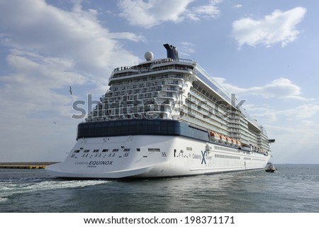 PIRAEUS, GREECE -June, 8 2014 Celebrity Equinox owned and operated by Celebrity Cruises, departing port of Piraeus. Ship built: 2008 Length 317,2 m (1041 ft) Decks 19  Passengers: 2,850 Crew: 1,250