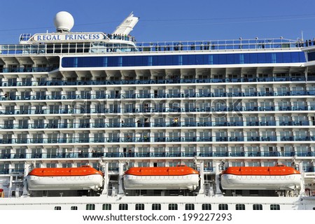 PIRAEUS, GREECE -MAY 27, 2014.  Safety lifeboats and passenger cabins of cruise ship Regal Princess. Ship was built in 2014 and has a capacity of 3560 passengers and 1346 crew.