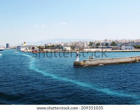 Piraeus, Greece - August 26, 2013: Rush hour in the port of Piraeus the biggest port in Greece and Europe in terms of passenger volume and one of the biggest commercial.