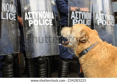 Athens Greece Nov 30.2010. The famous stray dog named \'Loukanikos\' is friend of demonstrators and he barks at riot police, he has shown up for numerous demonstrations in Athens over the past few years