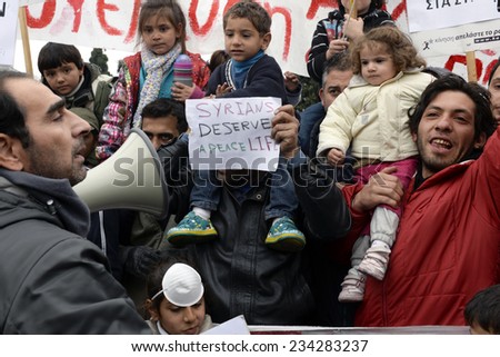 Athens Greece November 27 2014. Syrian war refugees sit in protest outside the Greek parliament 9 days, some of them on hunger strike, demanding asylum and a free passage to other countries in the E.U