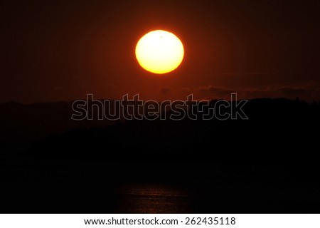 Central Greece, June 6, 2012 Planet Venus is seen passing as small dot in front of the Sun.  Venus passes very rarely directly between the Sun and Earth, a transit that will not occur again until 2117