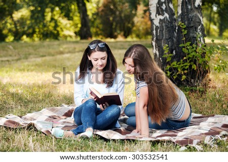 Students studying in a park