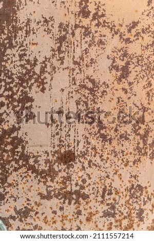 grunge background: rust on old painted metal surface, toning 