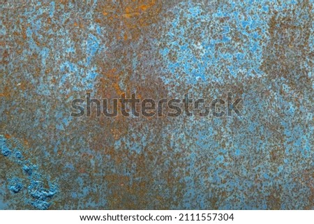 grunge background: rust on old painted metal surface, corrosion of steel, toning 