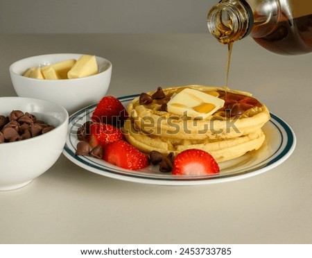 Similar – Image, Stock Photo Honey pouring over fried toasts with fruit