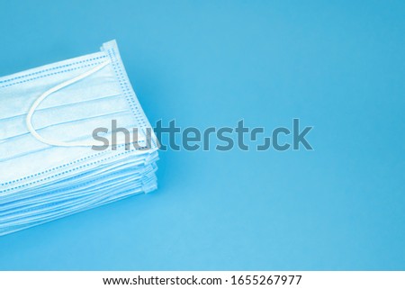 Similar – Image, Stock Photo Coronavirus.pile of medical face masks. Covid 19 concept