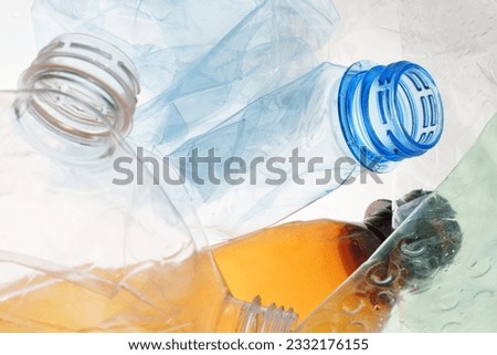 Similar – Image, Stock Photo Squashed empty plastic waste collected to recycling