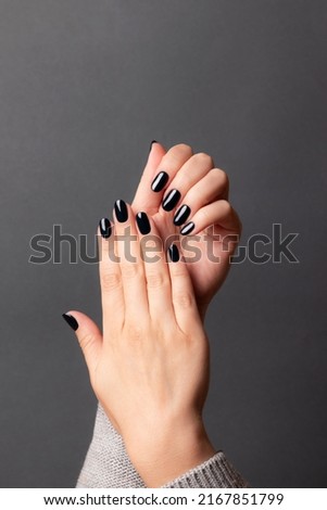 Similar – Image, Stock Photo female hands in winter gloves in a red and white striped hugging behind green Christmas tree outdoors. Christmas and New Year holiday concept