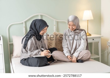 Similar – Image, Stock Photo Concentrated and enthusiastic girl plays table hockey.